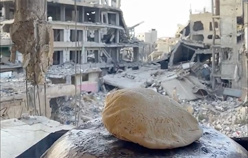 Thumbnail preview image for the video titled: Cooking traditional bread amidst the devastation