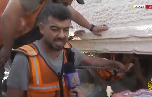 Thumbnail preview image for the video titled: Rescue teams struggle to save lives in Al-Nasr school with their basic worn out tools