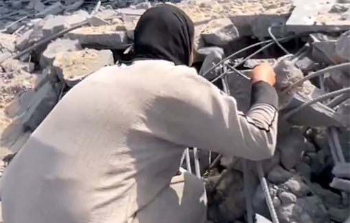 Thumbnail preview image for the video titled: Woman from the Abu Jamaa family calls out to her relatives under rubble