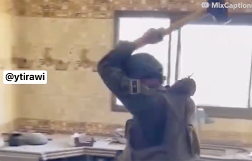 Thumbnail preview image for the video titled: IDF Soldier destroying a kitchen countertop with a sledgehammer