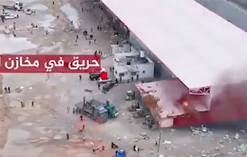 Thumbnail preview image for the video titled: Al-Qahera News documenting the IDF attacking an aid warehouse, during a famine, at the Rafah Crossing