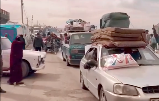 Thumbnail preview image for the video titled: Stream of vehicles as the displaced flee Rafah