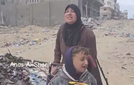 Thumbnail preview image for the video titled: Displaced family fleeing Rafah, mother doing her best to comfort her child