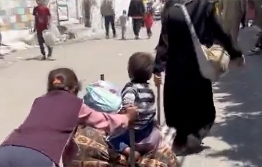 Thumbnail preview image for the video titled: Displaced family fleeing Rafah with only a cart