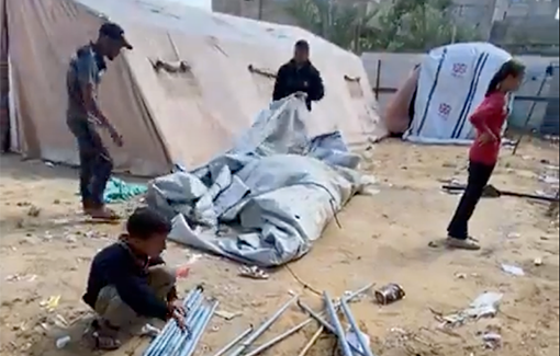 Thumbnail preview image for the video titled: Family skillfully packing up a tent while being displaced, for the seventh time, from Rafah