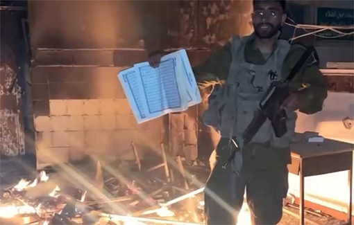 Thumbnail preview image for the video titled: IDF soldier Izhak Buznah burns a Quran inside in a burning mosque