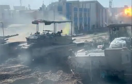 Thumbnail preview image for the video titled: Bored IDF soldiers film a synchronized tank attack against homes in Rafah City to post to social media