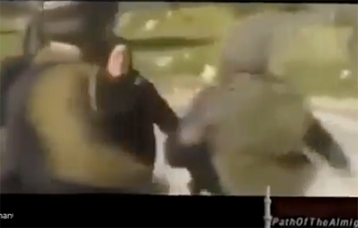 Thumbnail preview image for the video titled: Israeli soldiers beat an elderly Palestinian woman and throw stun grenades into a crowd