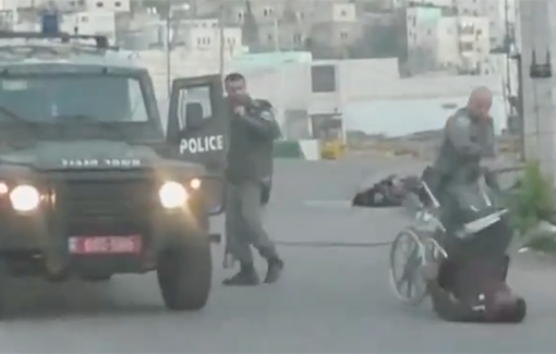 Thumbnail preview image for the video titled: Israeli police officers throw a Palestinian man out of his wheelchair, other officers throw stun grenades, point guns, and assault people