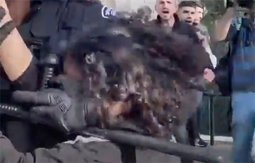 Thumbnail preview image for the video titled: Israeli police beat a young girl and shoot stun grenades into a crowd