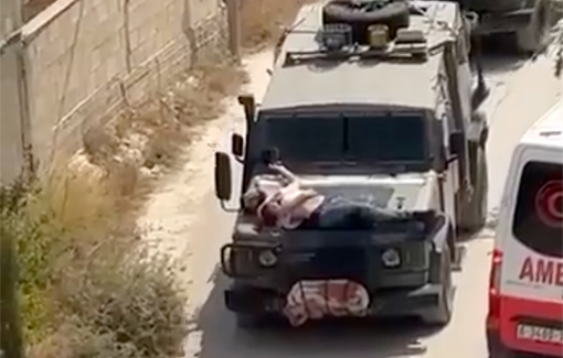 Thumbnail preview image for the video titled: The IDF uses a wounded Palestinian as a human shield, by tying him to their vehicle, in the al-Jabriyat neighborhood of Jenin