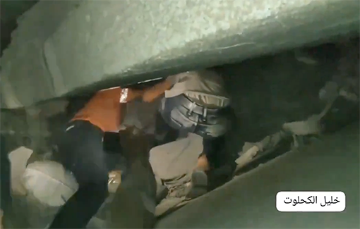 Thumbnail preview image for the video titled: Children stuck under the rubble of a home Israel bombed in Beit Lahia scream as rescue teams dig them out by hand