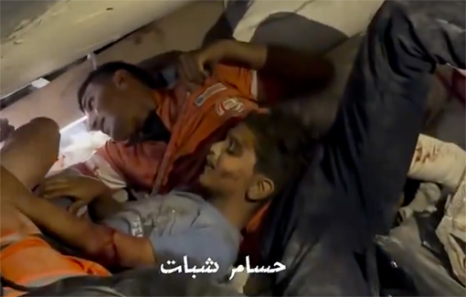 Thumbnail preview image for the video titled: Paramedics rescuing people, without equipment, after Israel bombed a home in Beit Lahia murdering ten people