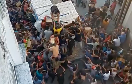 Thumbnail preview image for the video titled: Due to Israel's policy of starvation and murdering security guards, desperate Palestinians swarm a food aid truck in northern Gaza