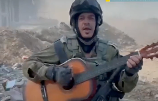 Thumbnail preview image for the video titled: IDF soldier Matan Cohen sings on guitar stolen from displaced Palestinian