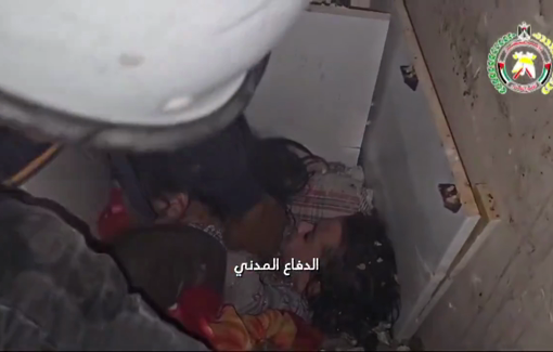 Thumbnail preview image for the video titled: Civil Defense crews rescue two girls after an Israeli bombing of their home