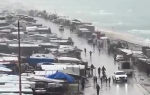 Thumbnail preview image for the video titled: Gaza refugees' tents under rain, sea, and strong winds