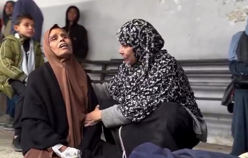 Thumbnail preview image for the video titled: Injured mother mourns her son killed by Israeli bombing of Al-Tabi'in school