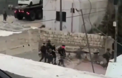 Thumbnail preview image for the video titled: Isralei arrest campaign targeting a young men during a raid on Kafr Ni'ma