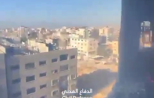 Thumbnail preview image for the video titled: Civil Defense put out fire in residential building following an Israeli strike