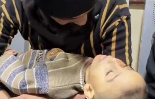 Thumbnail preview image for the video titled: Father holds his little son killed by an Israeli drone