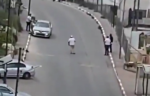 Thumbnail preview image for the video titled: Israeli settlers throwing garbage on Palestinians homes near "Kiryat Arba" settlement