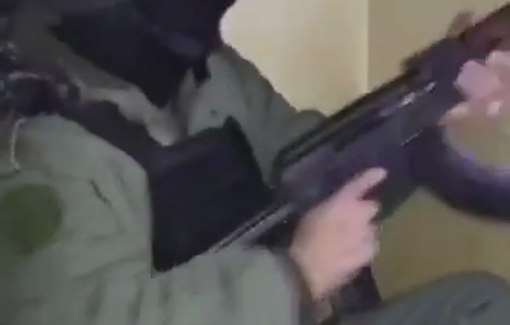 Thumbnail preview image for the video titled: A Palestinian Authority (PA) security officer has shared footage of himself indiscriminately shooting at civilian homes in the Jenin