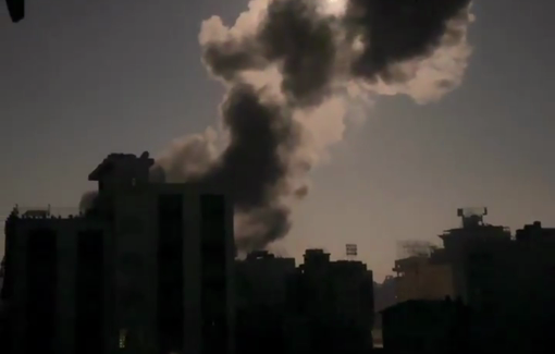 Thumbnail preview image for the video titled: Smoke billows over residential block following Israeli firebelt bombing