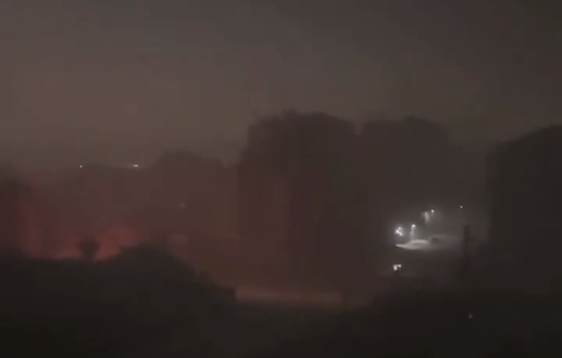 Thumbnail preview image for the video titled: Ambulances run through the smoky haze of Gaza City under relentless Israeli bombardment