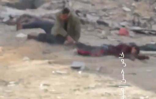 Thumbnail preview image for the video titled: Israeli troops kill a child and fire at man tyring to pull his body