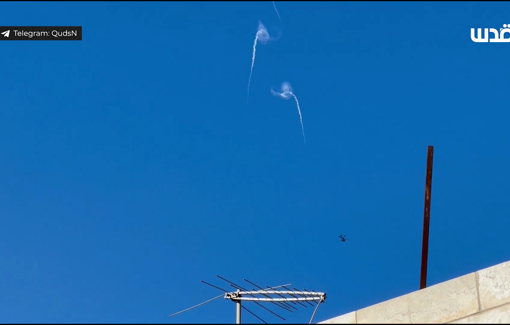 Thumbnail preview image for the video titled: The Israeli helicopter launches thermal bombs during its participation in the aggression on Jenin