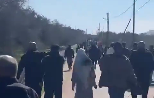 Thumbnail preview image for the video titled: Kfar Kila residents march into their village to liberate it