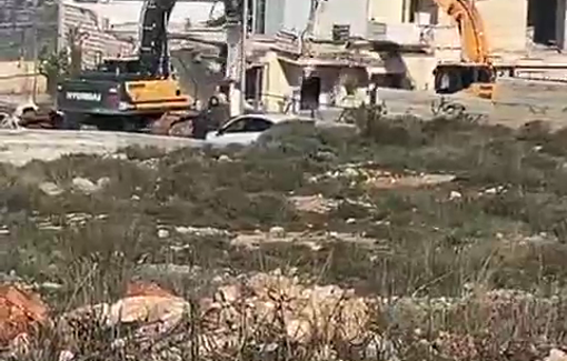 Thumbnail preview image for the video titled: Israeli forces and an excavator destroy a house and expel the family in the village of Deir Ibzi'a.