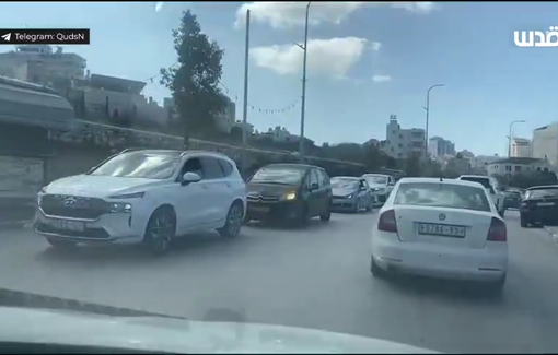 Thumbnail preview image for the video titled: Hundreds of Palestinian vehicles blocked by Israeli military checkpoint in Hebron