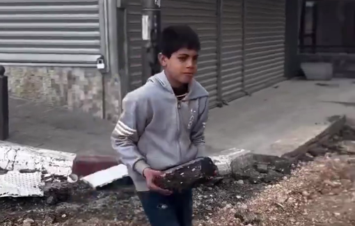 Thumbnail preview image for the video titled: After Israeli destroyed the roads a child took the initiative to place stones to prevent cars from passing