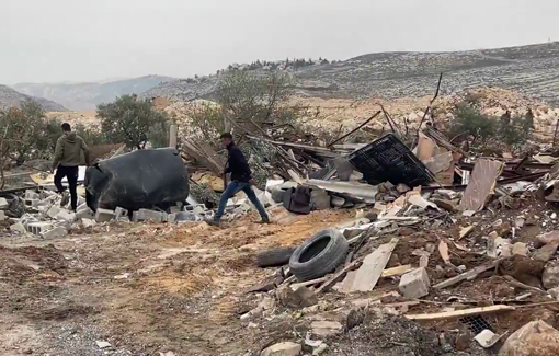 Thumbnail preview image for the video titled: Israeli bulldozers demolished two sheep barns this morning in Hizma, east of Jerusalem