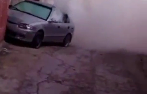 Thumbnail preview image for the video titled: Israeli forces launch tear gas canisters at a Palestinian vehicle during their raid of Yitma village