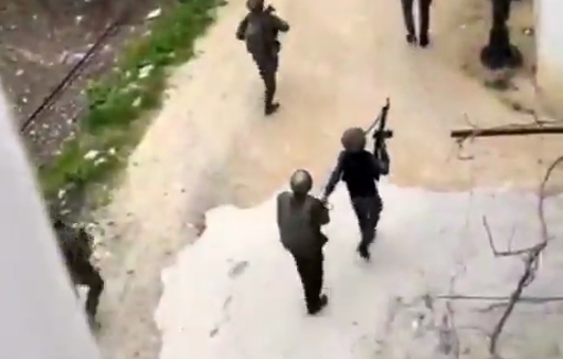 Thumbnail preview image for the video titled: The Israeli troops using a Palestinian prisoner as human shield during the storming of the town of Yamoun