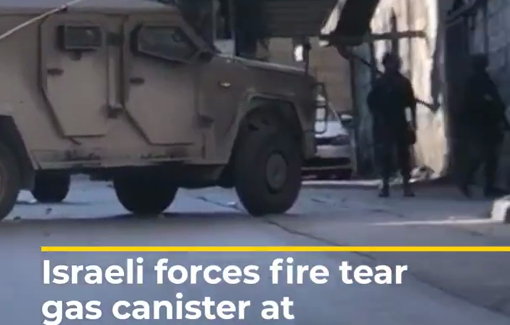 Thumbnail preview image for the video titled: Israeli soldier firing a tear gas canister directly at the journalist's camera