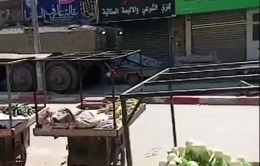 Thumbnail preview image for the video titled: An Israeli armoured vehicles deliberately run over Palestinian vehicles during the ongoing military invasion of Jenin