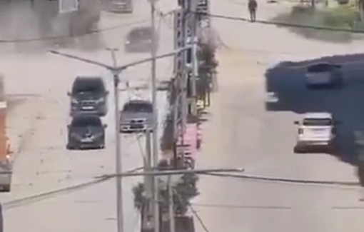 Thumbnail preview image for the video titled: 3 Israeli Eitan APC's and a Tigris APC driving through Jenin City at the Al-Jalbouni roundabout