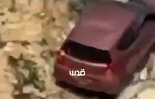 Thumbnail preview image for the video titled: Israeli soldiers push a Palestinian's car off a hill in Surif after arresting his driver in Surif near Hebron