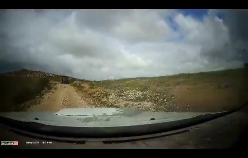 Thumbnail preview image for the video titled: Activits footage of Israeli settler Ilai Federman faking a car-ramming to provoke them