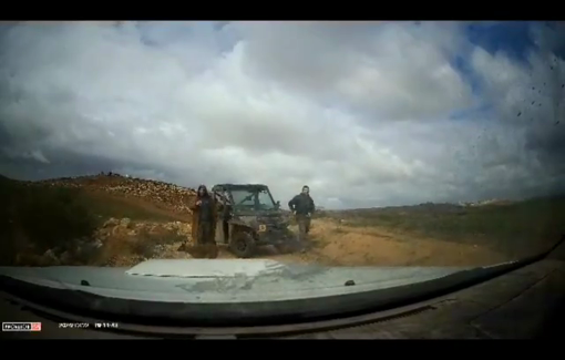 Thumbnail preview image for the video titled: Slow-motion footage of Israeli settler Ilai Federman faking a car-ramming to provoke activists