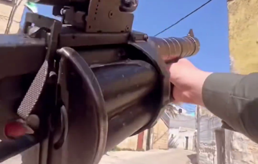 Thumbnail preview image for the video titled: An Israeli female soldier filmed herself in Nablus firing grenades at civilian homes for no reason