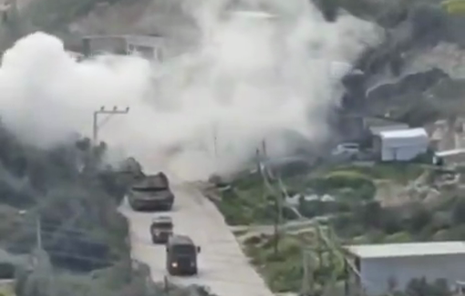 Thumbnail preview image for the video titled: Israeli tanks launch smoke shells targeting Palestinian homes during their raid on Burqin