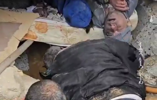 Thumbnail preview image for the video titled: Trying to pull the bodies of victims buried under their home by Israeli bombing