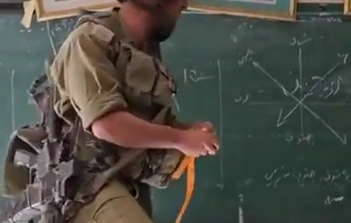 Thumbnail preview image for the video titled: An IDF Officer inside a Gazan School delivers a  “Zionist humanitarian teaching mission in Gaza” that includes the call to return of settlements to Gaza (Gush Katif).