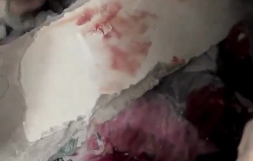 Thumbnail preview image for the video titled: Recovering bodies of victims from the rubble of Al-Nasr school