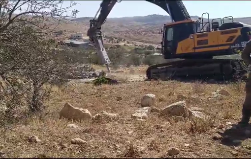 Thumbnail preview image for the video titled: IDF demolition vehicles destroy a water well in the Wadi Al-Jawaya